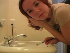 UhBabe presents: Redhead in tee shirt does her makeup
