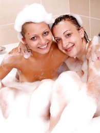 UhBabe presents: Naughty sexy young chicks taking a hot bubble bath together