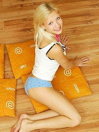 UhBabe presents: Amazing blonde nude teen decided to place herself at the attic of her wooden house on four orange pillows for her dirty intention.